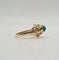 Bague 49 Bague or jaune sertie d'une pierre verte 58 Facettes