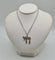Collier Collier et pendentif HAI or blanc 58 Facettes