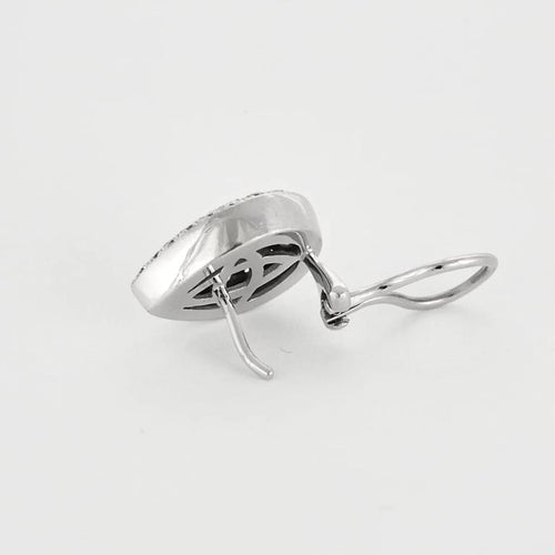 Boucles d'oreilles Boucles d'oreilles poire serties de topaze bleue en or blanc et diamants 58 Facettes LJ27