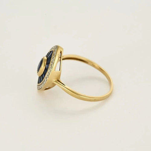 Bague 62 Bague navette en or jaune, diamants et saphirs calibrés 58 Facettes 58FC116