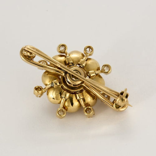 Broche Broche "fleur" en Or jaune 18k et diamants 58 Facettes SMA0401