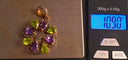 Pendentif Pendentif or et argent avec améthystes, péridots et diamants 58 Facettes R 650  Rie