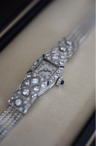 Montre Chopard - Montre femme Art déco en platine, or blanc 14 K et diamants 58 Facettes CHO-100