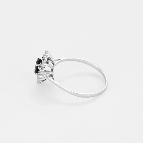 Bague 60.5 Bague marguerite en or blanc, saphir et diamants 58 Facettes 58FC103