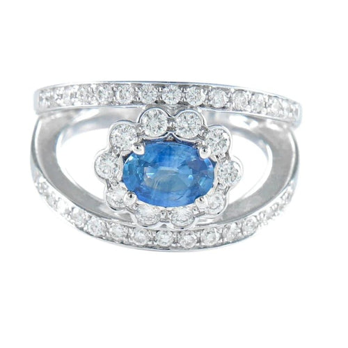 Bague 52 Bague marguerite en or gris et saphir entouré de diamants 58 Facettes 418 00227