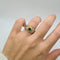 Bague 50 Bague or jaune sertie d’émeraude, diamants et rubis 58 Facettes