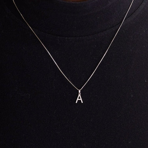 Pendentif Pendentif "A" or blanc 18 carats diamants 58 Facettes