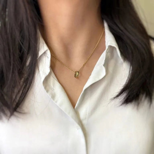 Collier Cartier Trinity - Collier pendentif en trois ors 750‰ 58 Facettes 250212R