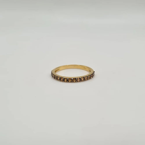 Bague 54 Demi-alliance or jaune 18 carats sertie de saphirs oranges 58 Facettes