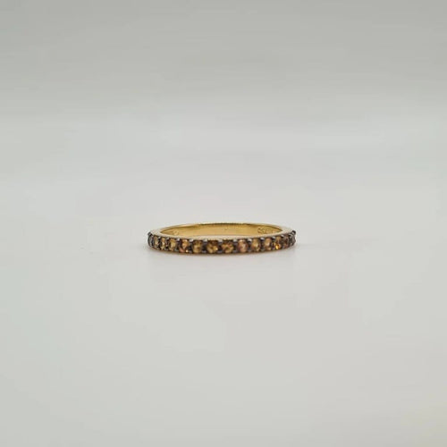 Bague 54 Demi-alliance or jaune 18 carats sertie de saphirs oranges 58 Facettes