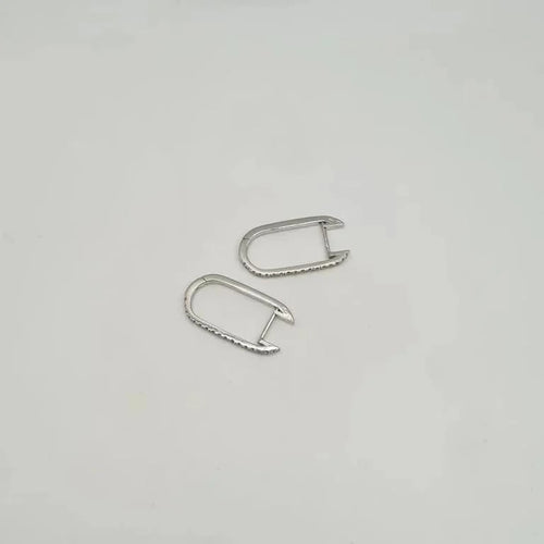 Boucles d'oreilles Créoles or blanc 18 carats serties diamants naturels 58 Facettes