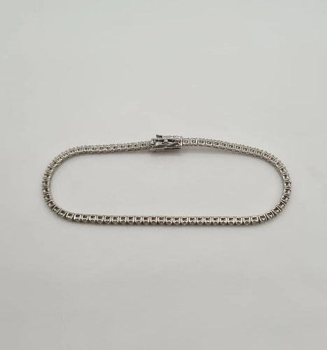 Bracelet Bracelet tennis or blanc 18 carats serti de diamants 58 Facettes
