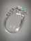 Bague Bague or blanc aigue-marine entourage saphirs 58 Facettes R 1585   NBE