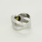 Bague 51.5 Bague moderniste en or gris et péridot 58 Facettes ALB2061