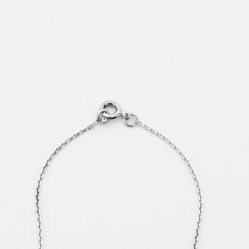 Collier Collier or blanc 18 carats sertie d'un diamant princesse 58 Facettes