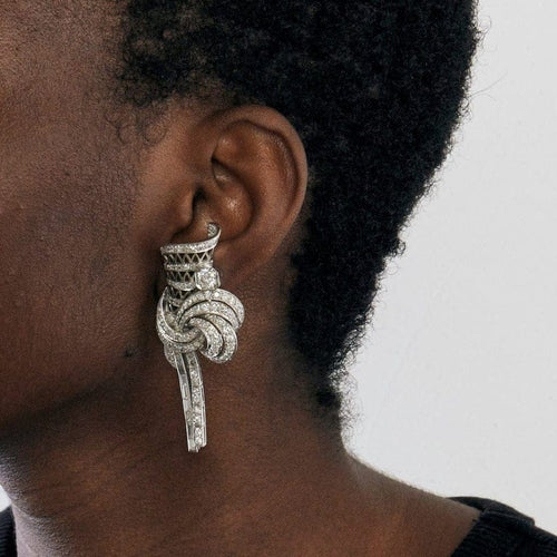 Boucles d'oreilles Boucles d'oreilles clips en platine et diamants taille brillant et baguette 58 Facettes AB34