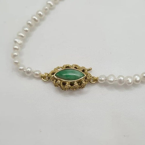 Bracelet Bracelet or jaune 14 carats serti de perles et pierre verte 58 Facettes