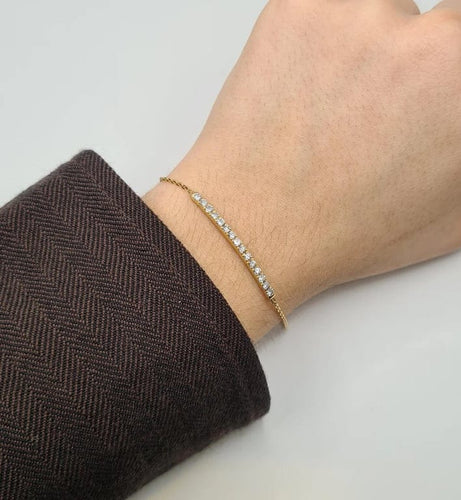 Bracelet Bracelet or jaune 18 carats serti d’une barrette de diamants 58 Facettes