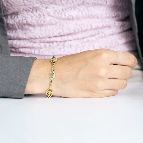 Bracelet Bracelet en or jaune, saphir, topaze rose, émeraude et diamant 58 Facettes PER1612