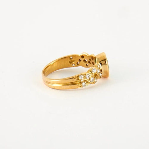 Bague 55 Bague en Or jaune, diamants & émeraude 58 Facettes
