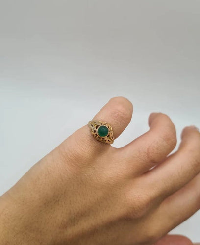 Bague 49 Bague or jaune sertie d'une pierre verte 58 Facettes