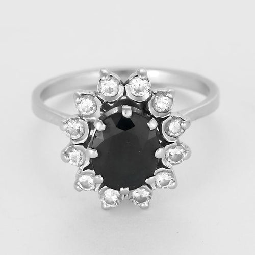 Bague 52.5 Bague marguerite en or blanc, saphir et diamants 58 Facettes DIE1840