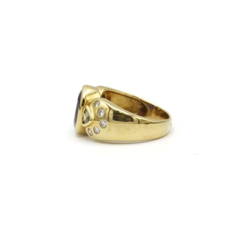 Bague 46 Bague en or jaune 750‰ sertie d’améthyste, péridots et diamants 58 Facettes 250290R