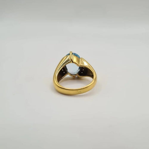 Bague 53 Bague or jaune 18 carats sertie d’une topaze bleue et diamants 58 Facettes