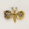 Broche Broche papillon en Or jaune, or gris et diamants 58 Facettes CAN1572