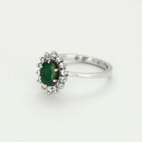 Bague 53 Bague marguerite en or blanc 18K, émeraude et diamants 58 Facettes 58FC162