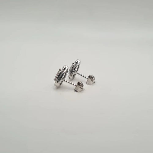 Boucles d'oreilles Boucles d'oreilles en or blanc 18 carats serties de diamants naturels 58 Facettes