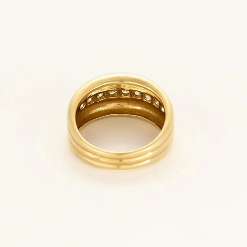 Bague 59 Bague jonc godronnée en or jaune et diamants 58 Facettes PAL3880