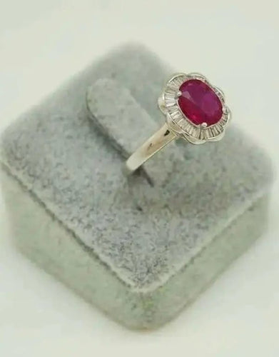 Bague 54 Bague en Or blanc, rubis et de diamants 58 Facettes