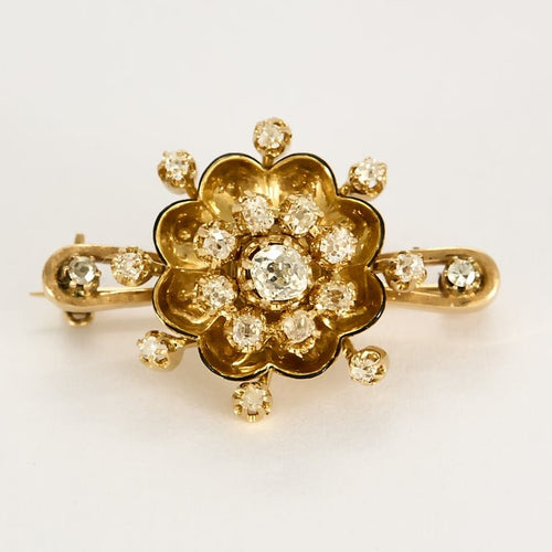 Broche Broche "fleur" en Or jaune 18k et diamants 58 Facettes SMA0401