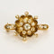 Broche Broche "fleur" en Or jaune 18k et diamants 58 Facettes SMA0401