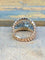 Bague 50 Bague bandeau double jonc torsadé en or blanc et or rose, diamants 58 Facettes bM