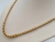 Collier Collier en or jaune 18 carats 58 Facettes
