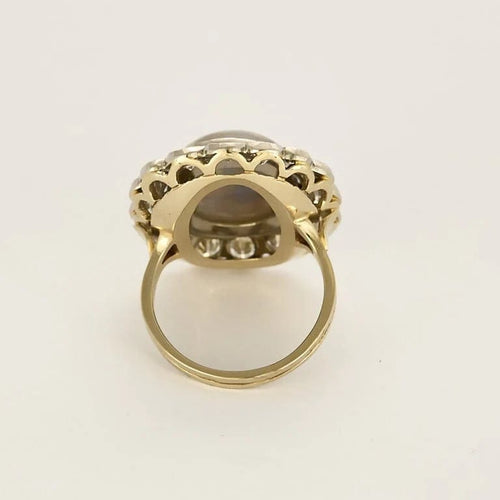 Bague 53.5 Importante bague marguerite en or blanc, opale et diamants 58 Facettes 58FC106