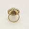 Bague 53.5 Importante bague marguerite en or blanc, opale et diamants 58 Facettes 58FC106