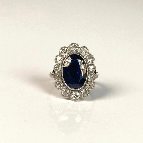 Bague 49 Bague Marguerite Art déco en or blanc 18 carats saphir et diamants 58 Facettes