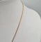 Collier Collier or rose serti de saphirs et d'un diamant 58 Facettes