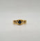 Bague 56 Bague or jaune sertie de diamants et d’un saphir 58 Facettes