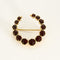Broche Broche "Croissant de Lune" en or jaune et grenats 58 Facettes NAR1038