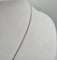 Collier Collier et pendentif croix or blanc sertis de diamants 58 Facettes