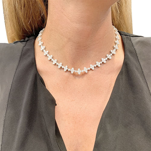Collier Collier fleurettes en or blanc 750 et diamants 58 Facettes 31829