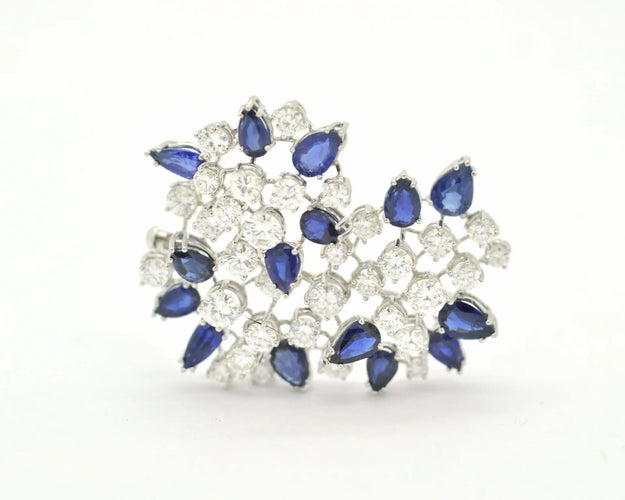 Broche Broche en or blanc 18 kt avec diamants et saphirs 58 Facettes 8226