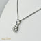 Pendentif Pendentif en or blanc 14 carats en forme de fleur, diamants 58 Facettes 2313