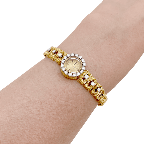 Montre Omega - Montre de dame vintage en deux ors 750/000 et diamants 58 Facettes 34660