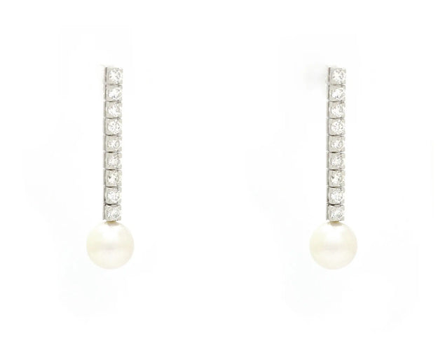 Boucles d'oreilles Boucles d’oreilles tennis en or blanc 18 ct avec perles et diamants 58 Facettes 14013