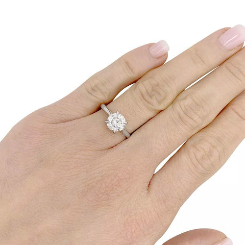 Bague 52 Bague solitaire en or blanc 750 sertie d’un diamant 1,36 ct 58 Facettes 32183